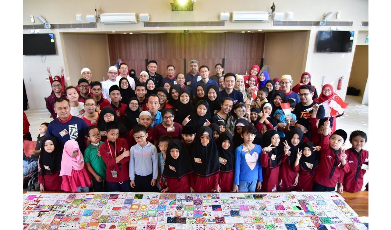 Students,Club Rainbow beneficiaries and their caregivers at the Coaster Magnet Design Workshop. Photo courtesy: MUIS