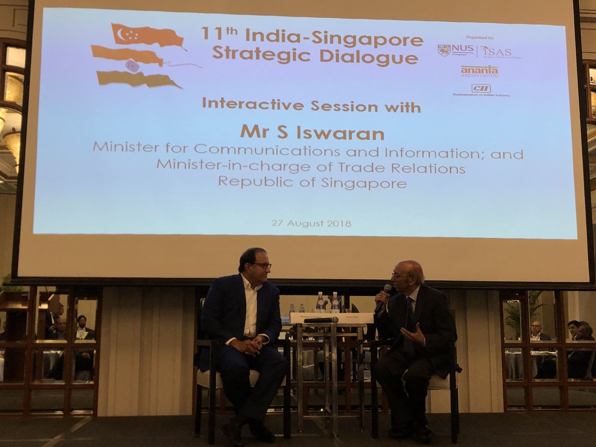 Singapore Minister for Commerce and Information S Iswaran (left) with Tarun Das, Chairman, IEG, conversing about deepening India-Singapore economic and trade relations over the next decade at the 11th India-Singapore Strategic Dialogue. Photo courtesy: Twitter/@jawedashraf5