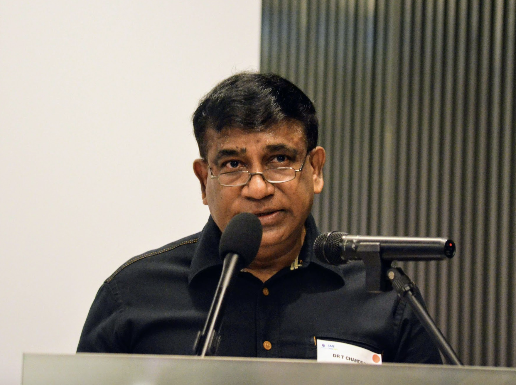 Dr T Chandroo, Chairman, SICCI encouraging SMEs in Little India area to use the SME Centre Photo: Connected to India