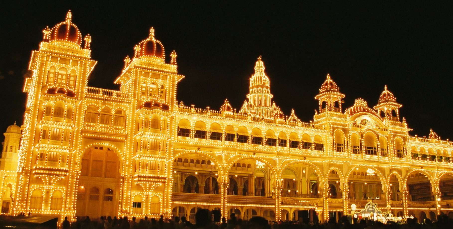 During the entire ten-day celebrations, the Mysuru Palace is lit up decked in colourful lights. Photo courtesy: Wikimedia