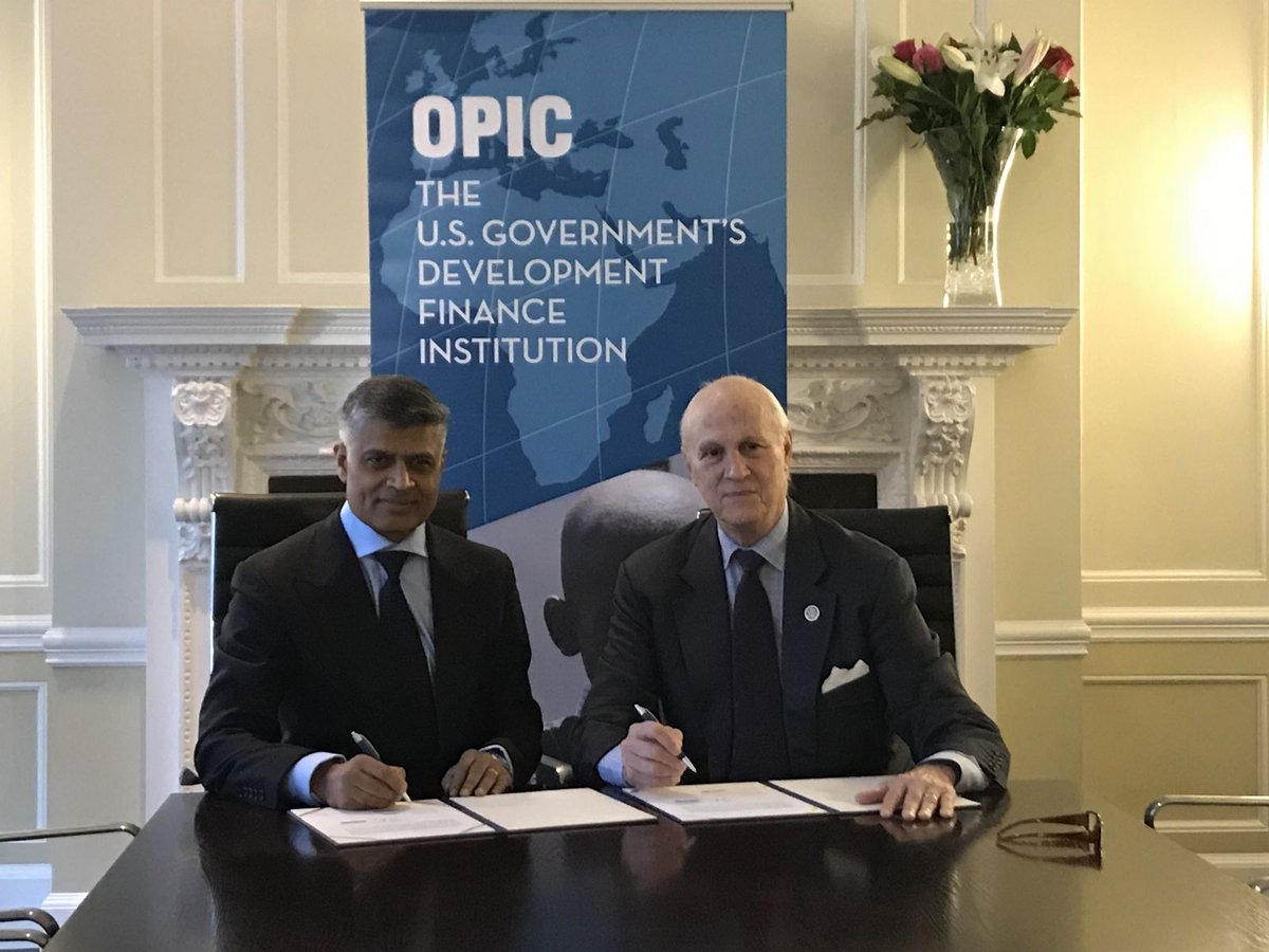 Greater Pacific Capital(GPC) Founder and Chief Executive Officer Ketan Patel [Left] and Overseas Private Investment Corporation(OPIC) Counsellor to the President Frank Dunlevy sign agreement in London. (Photo couortesy: OPIC
