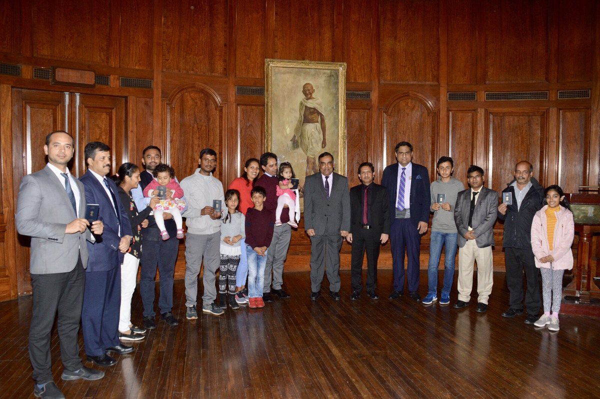 Indian High Commissioner to UK Y K Sinha with Darlene and other recipients of passport printed under MEA's Passport Seva Programme. (Photo courtesy: High Commission of India, London