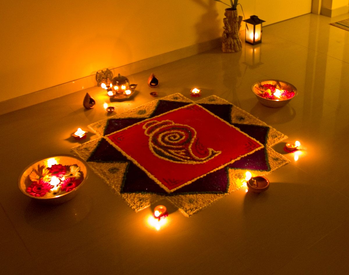 Rangoli is a special feature of Deepavali when patterns are created on the floor or the ground using materials such as colored rice, dry flour, colored sand or flower petals. Photo courtesy: Wikimedia