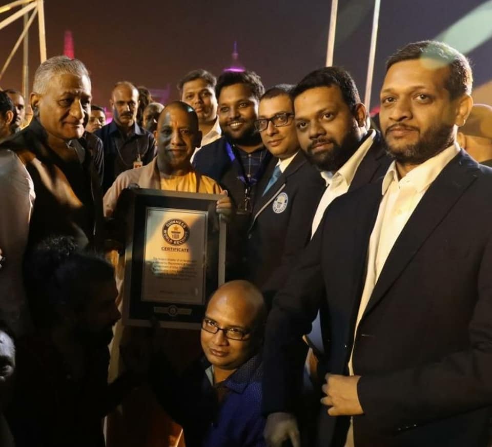 Chief Minister of Uttar Pradesh Yogi Adityanath holding the certificate of Guinness Book of World Records at Ayodhya. Photo courtesy: Facebook page of UP Tourism