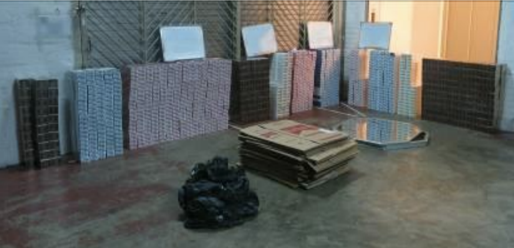 A total of 1,200 cartons of duty-unpaid cigarettes were seized in the operation. Photo courtesy: Singapore Customs 
