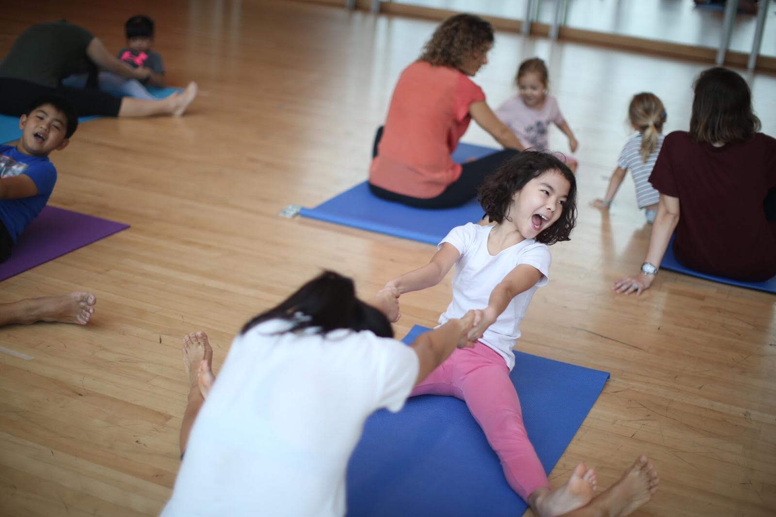 The kids having fun at the basic yoga workshop! :D Photo courtesy: Esplanade