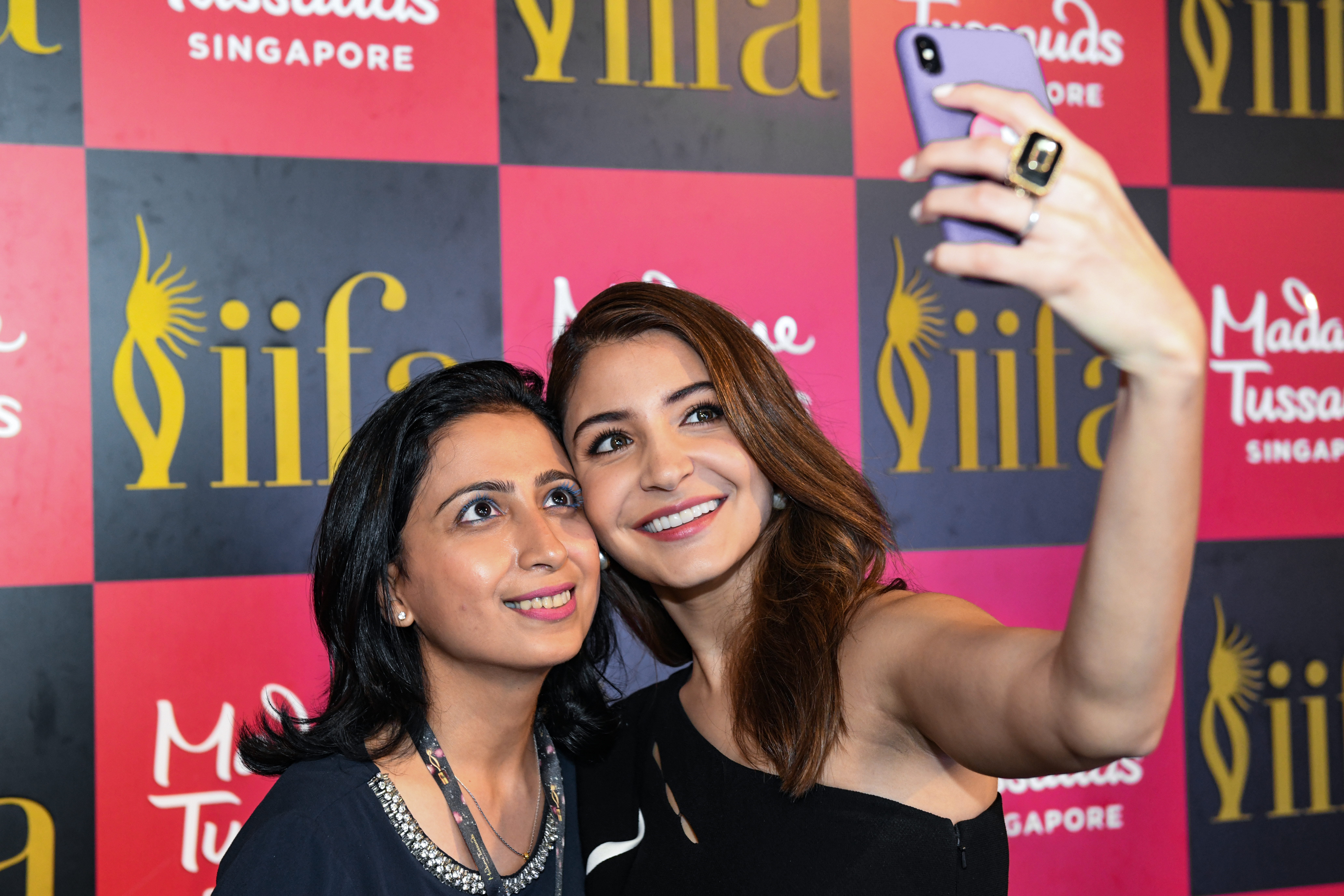 Anushka Sharma with Natasha Keswani, a fan who won the 'Instagrammer for a day' contest, at Madame TussaudsPhoto courtesy: Madam Tussauds Singapore
