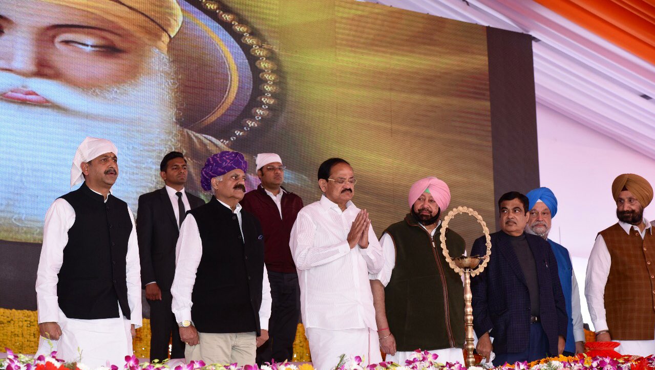 Vice-President of India Venkaiah Naidu (third from left in white attire) was present at the event to lay the foundation stone for construction of the Kartarpur Corridor. Punjab Chief Minister Captain Amarinder Singh (fourth from left) and Indian Transport Minister Nitin Gadkari (fifth from left) were also present on the occasion. Photo courtesy: Twitter@/VicePresidentOfIndia