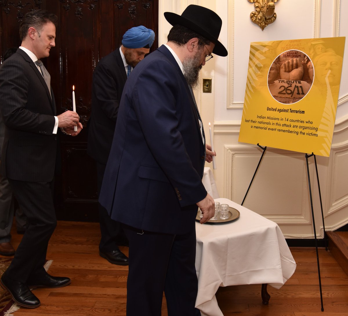 Lighting of candles by Ambassador Navtej Sarna, Ambassador-at-Large and Coordinator for Counter terrorism Nathan A. Sales, Rabbi Levi Shemstov, Executive Vice President, American Friends of Lubavitch (Chabad) at Indian Embassy, US (Photo Courtesy: MEA