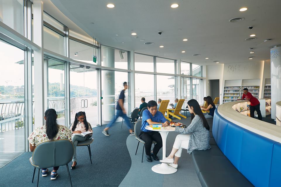 Visitors can enjoy the magnificent beauty of Sentosa while sitting at the new library@harbourfront at VivoCity. Photo courtesy: Facebook page of  National Library Board