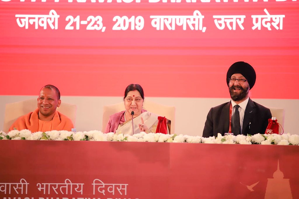 UP Chief Minister Yogi Adiyanath,  New Zealand MP Kanwaljit Singh Bakshi and Minister of External Affairs Sushma Swaraj share a lighter moment with audience at Pravasi Bhartiya Divas 2019 in Varanasi. Photo courtesy: PBD Convention