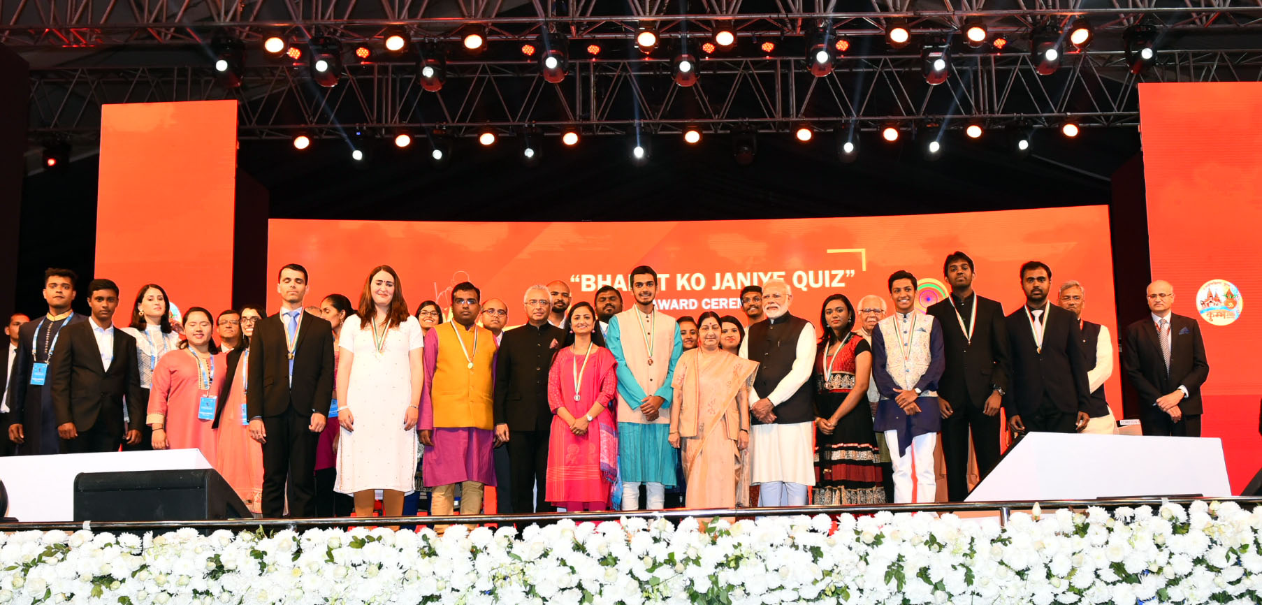 Prime Minister Narendra Modi with the winners of Know India Quiz, at the inauguration of the 15th Pravasi Bharatiya Divas convention 2019 in Varanasi. Prime Minister of Mauritius Pravind Jugnauth, the Minister for External Affairs Sushma Swaraj and other dignitaries are also seen. Photo courtesy: PMO