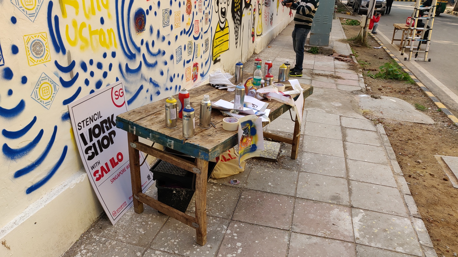 Art paraphernalia and spray-painting cans are a silent testament to the enthusiasm with which budding street artists took to the activity in Sam Lo's stencil workshop as part of the Singapore Weekender event. Photo: Connected to India