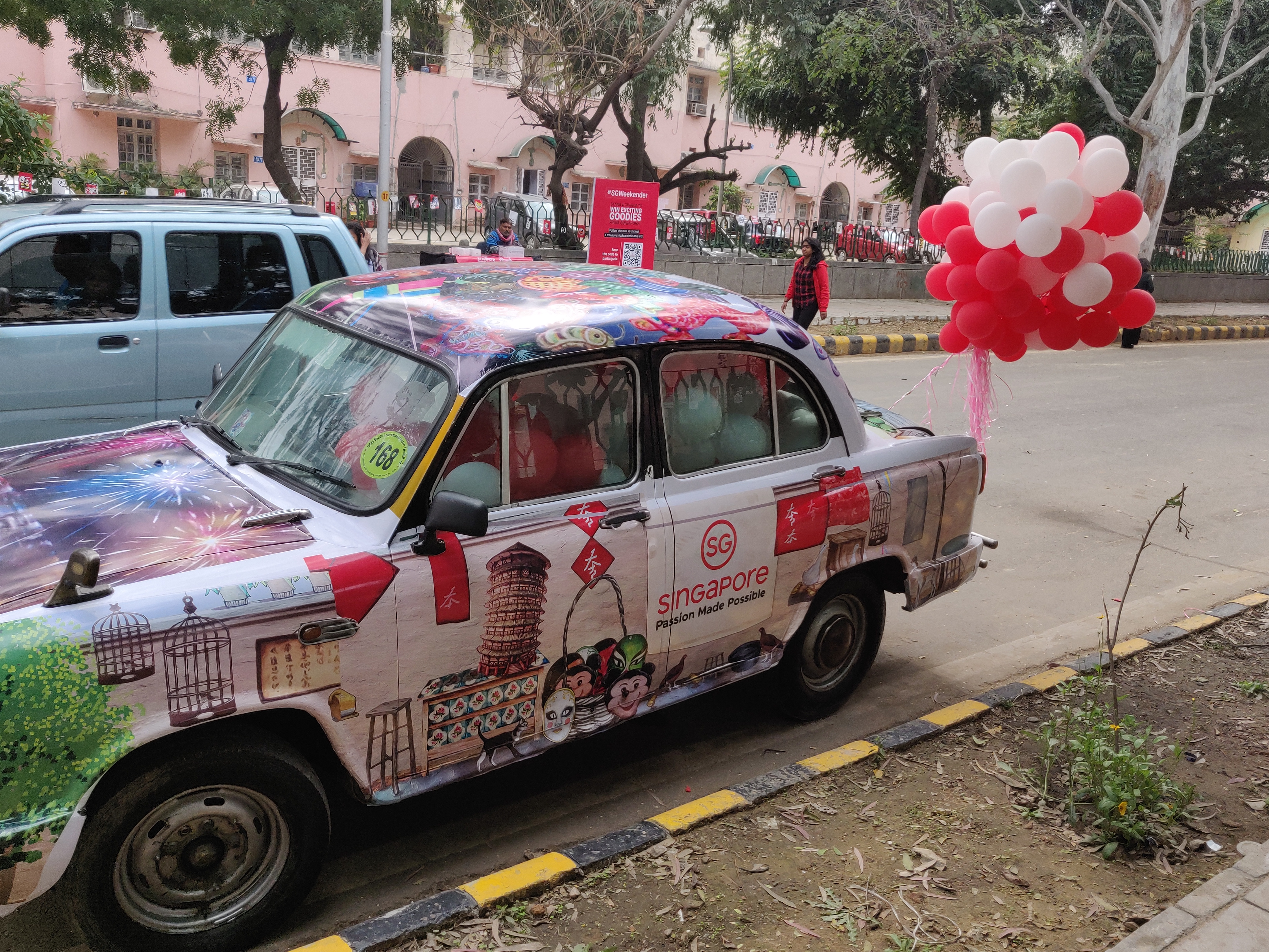 A tricked-out Ambassador car parked on Singapore Lane highlights the enthusiasm with which the street artists have descended on Delhi. Photo: Connected to India