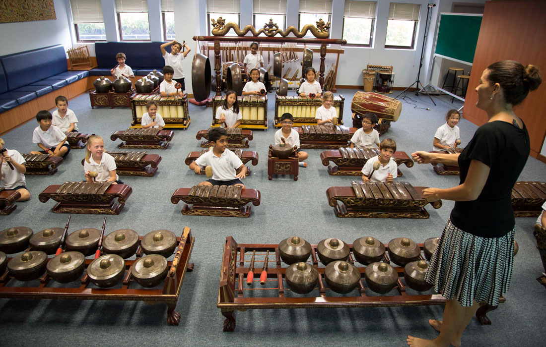   Students learning to play various musical instruments at the Singapore Amercian School. Photo courtesy: SAS