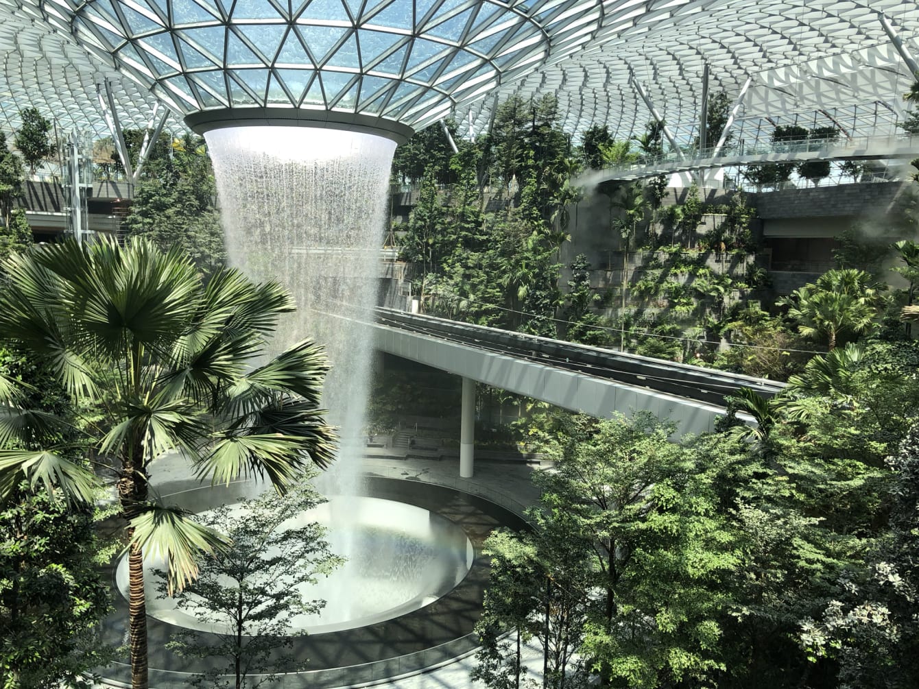 Get up close and personal with the majestic Rain Vortex and lush Forest Valley when Jewel Changi Airport opens. Photo courtesy: Changi Airport Group
