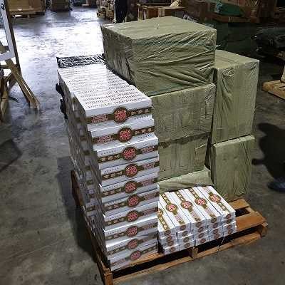 The seized contraband of cigarettes which were concealed within specially-hollowed game machines. Photo courtesy: ICA