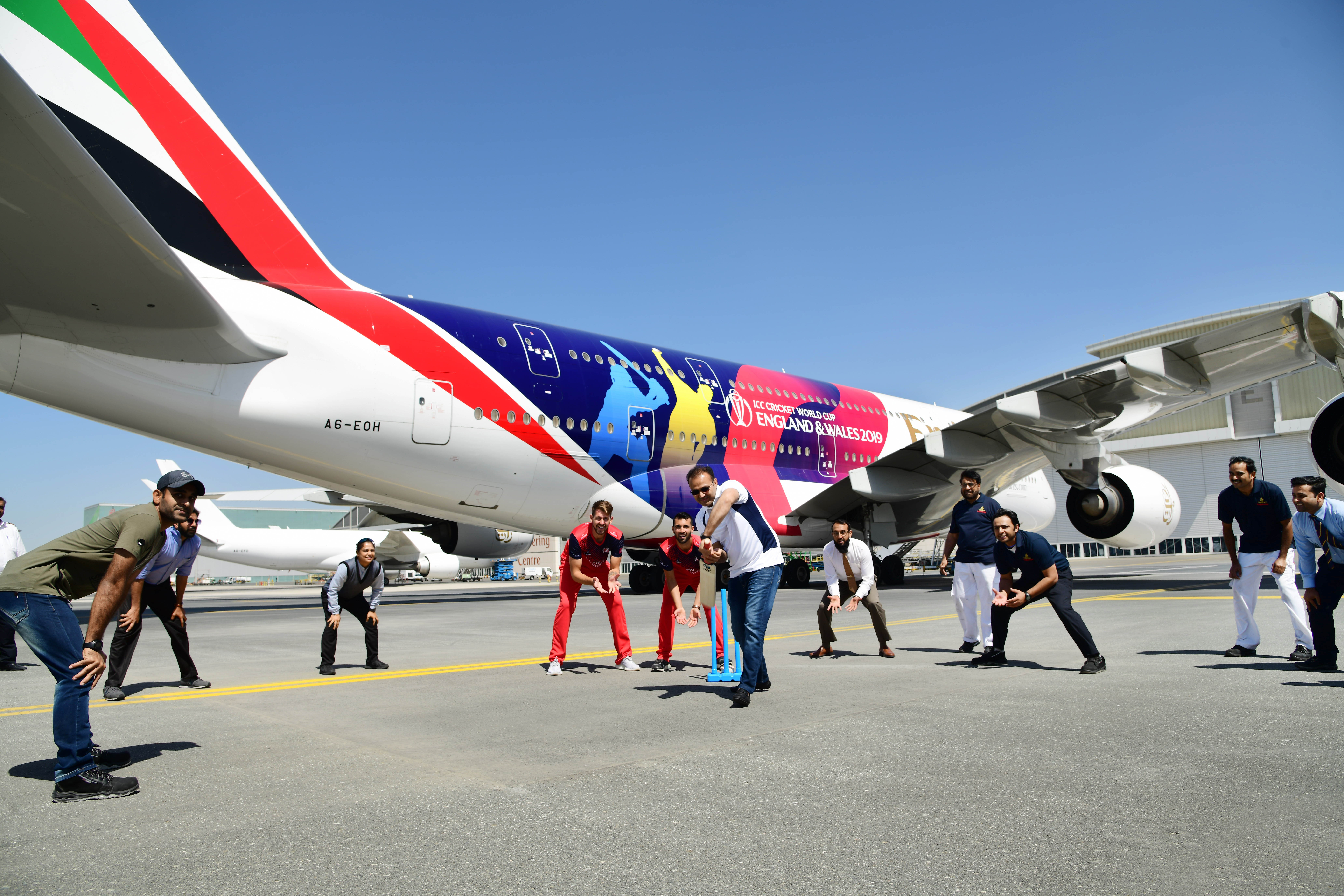 Former Indian cricketer Virendra Sehwag playing cricket with Emirates Engineering staff on the tarmac of Dubai airport. Photo courtesy: Emirates
