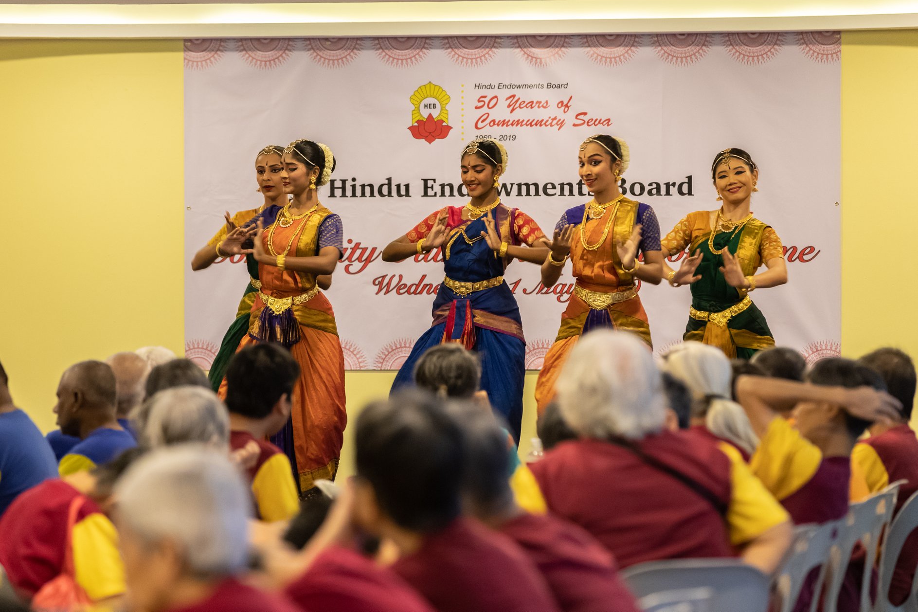 Residents at Sunlove Home enjoying an Indian dance performance. Photo courtesy: Hindu Endowments Board