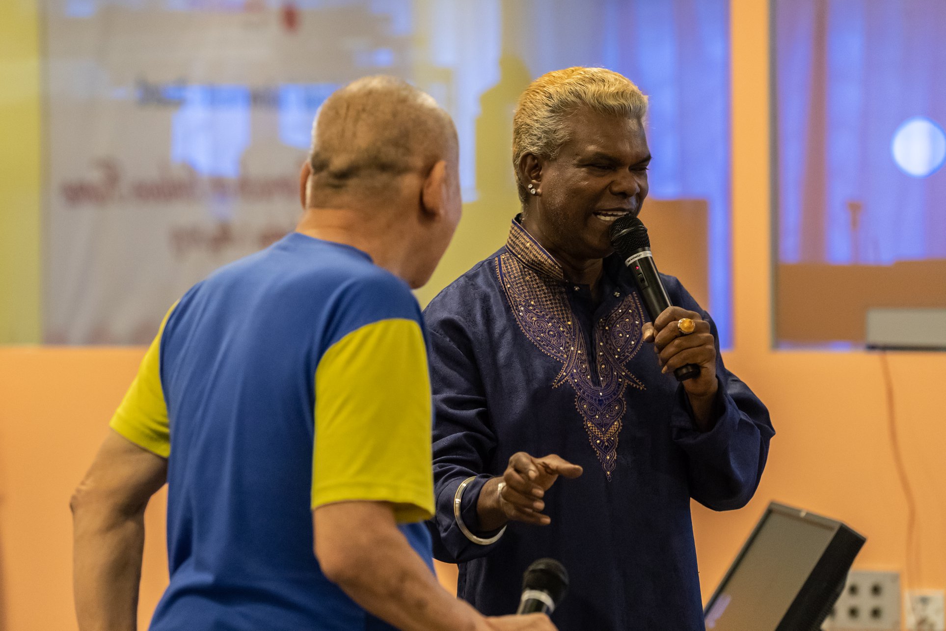 Residents at Sunlove Home had fun participating in a karaoke session. Photo courtesy: Hindu Endowments Board