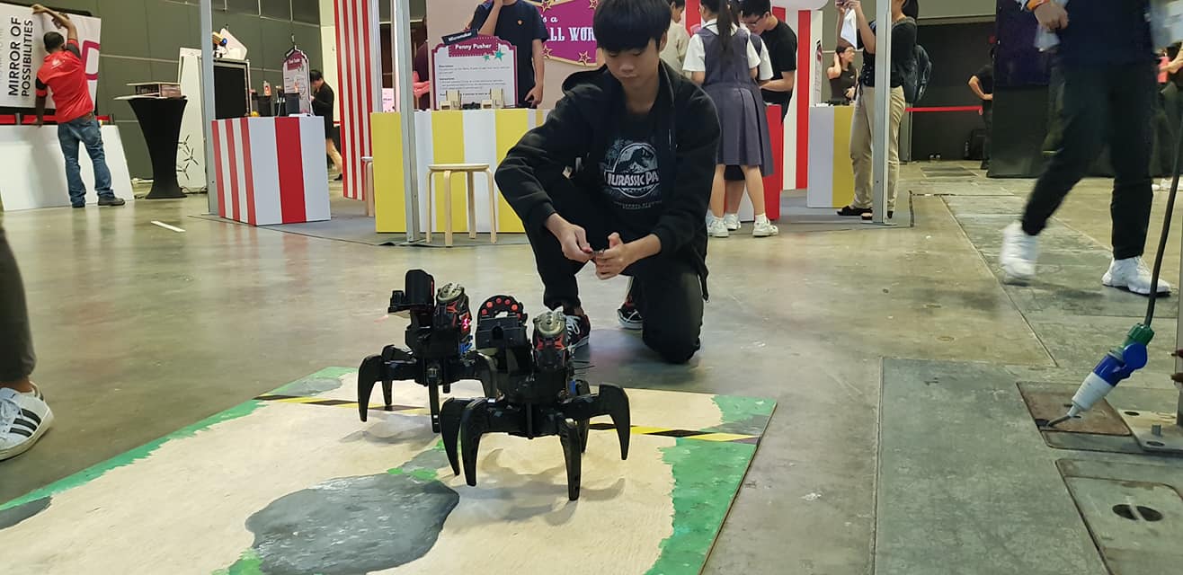 A young visitor trying out the drones at Tech Saturday 2018. Photo courtesy: IMDA