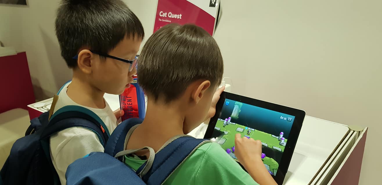 Boys having fun with the interactive games at Tech Saturday 2018. Photo courtesy: IMDA