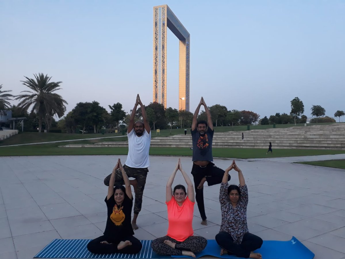  Yoga enthusiasts performing various postures near Dubai Frame. Photo courtesy: Twitter/@cgidubai