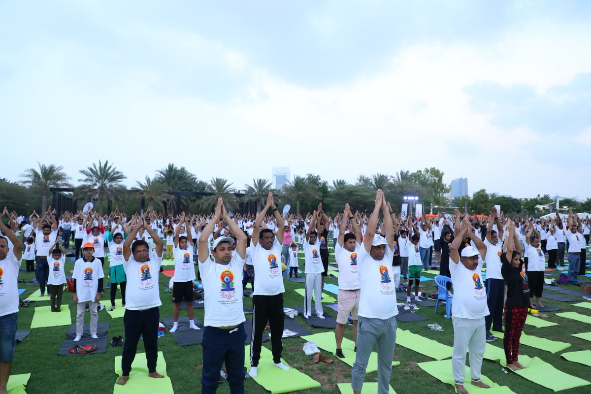   People across all age groups performing yoga asanas on mats in Abu Dhabi to mark the International Day of Yoga. Photo courtesy: Twitter/@IndembAbuDhabi