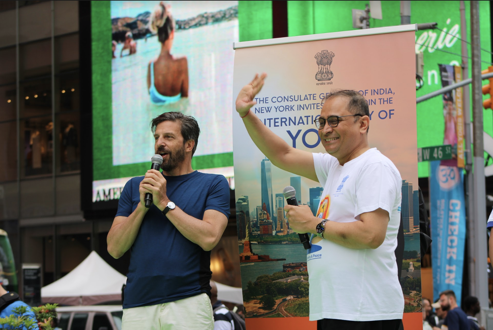 India’s Consul General Sandeep Chakravorty, waving to the crowds, congratulated the initiative in Times Square. Photo courtesy: Kaustubh Shankar