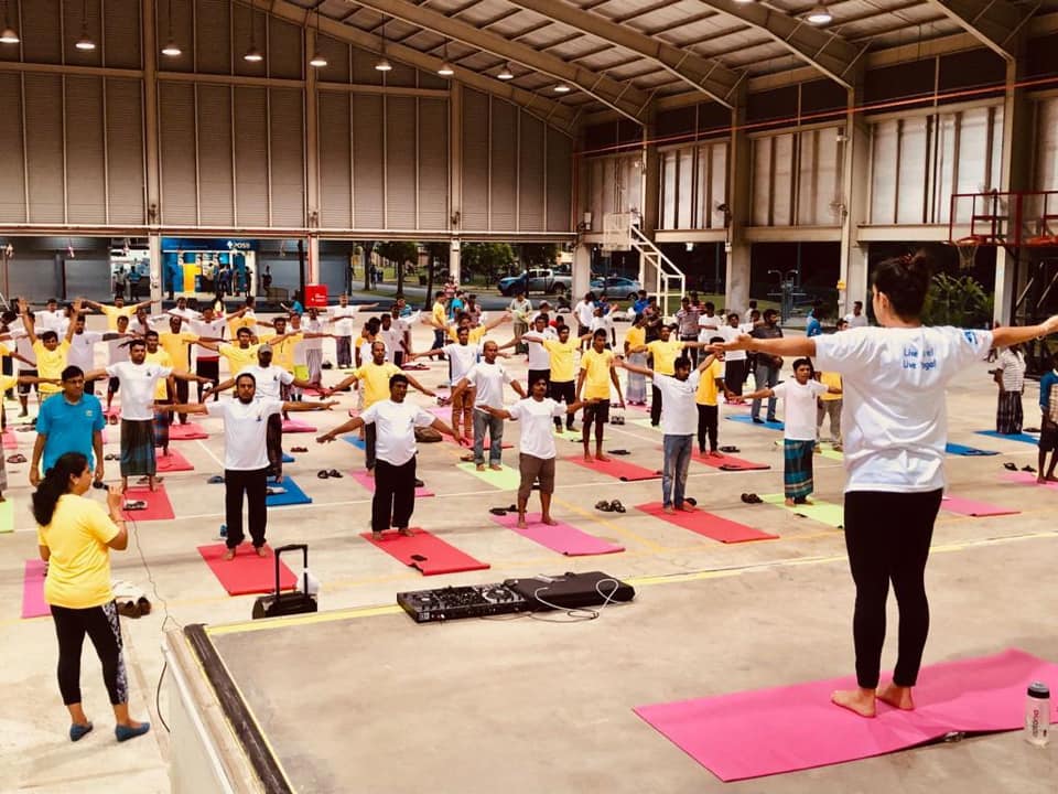 Migrant workers joined in the yoga session at the Penjury Recreation Centre for Migrant Workers. Photo courtesy: High Commission of India, Singapore