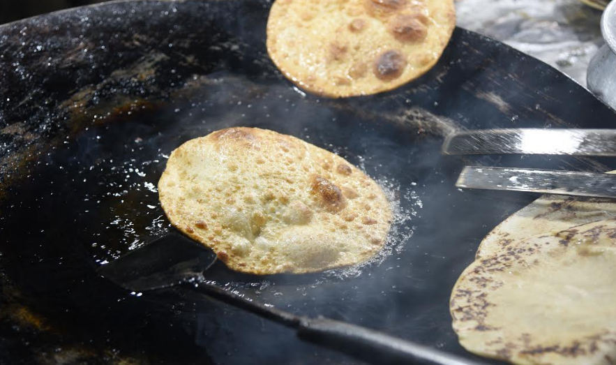 The kebabs are served with freshly prepared parathas. Photo: Connected to India