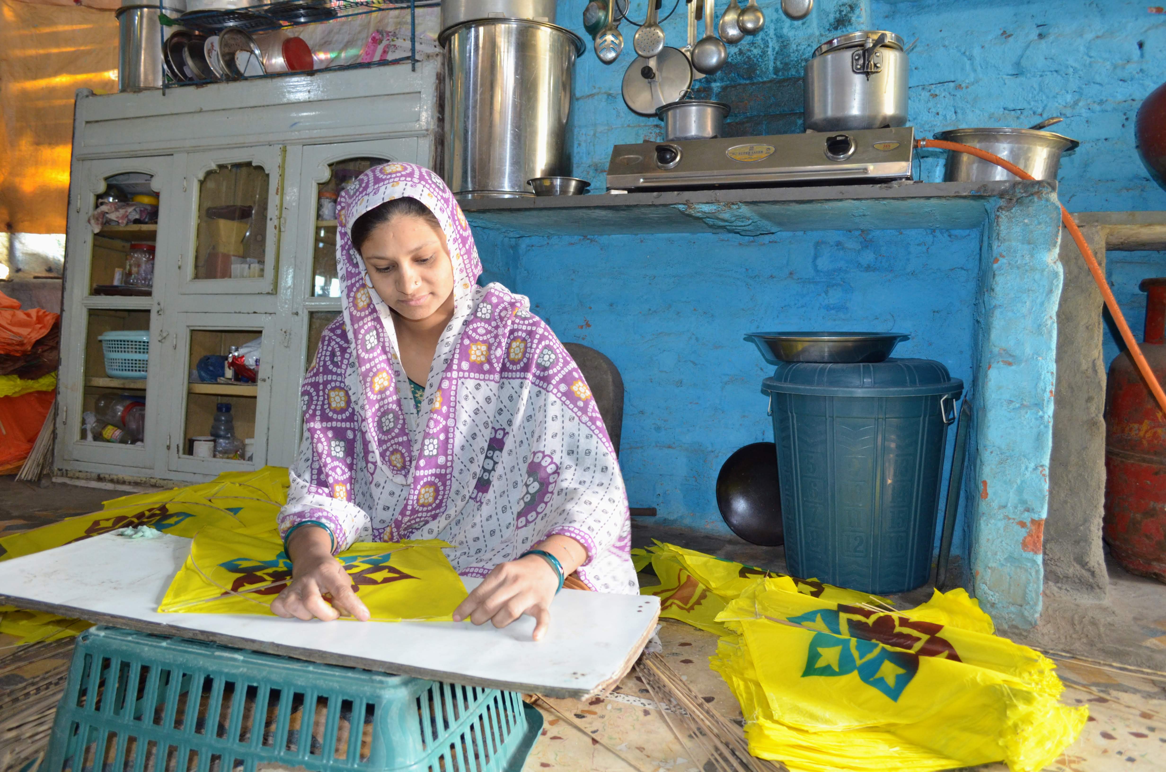 The kites are made mostly by cash-starved but dextrous Muslim women in Ahmedabad. Photo courtesy: Kunal Trivedi