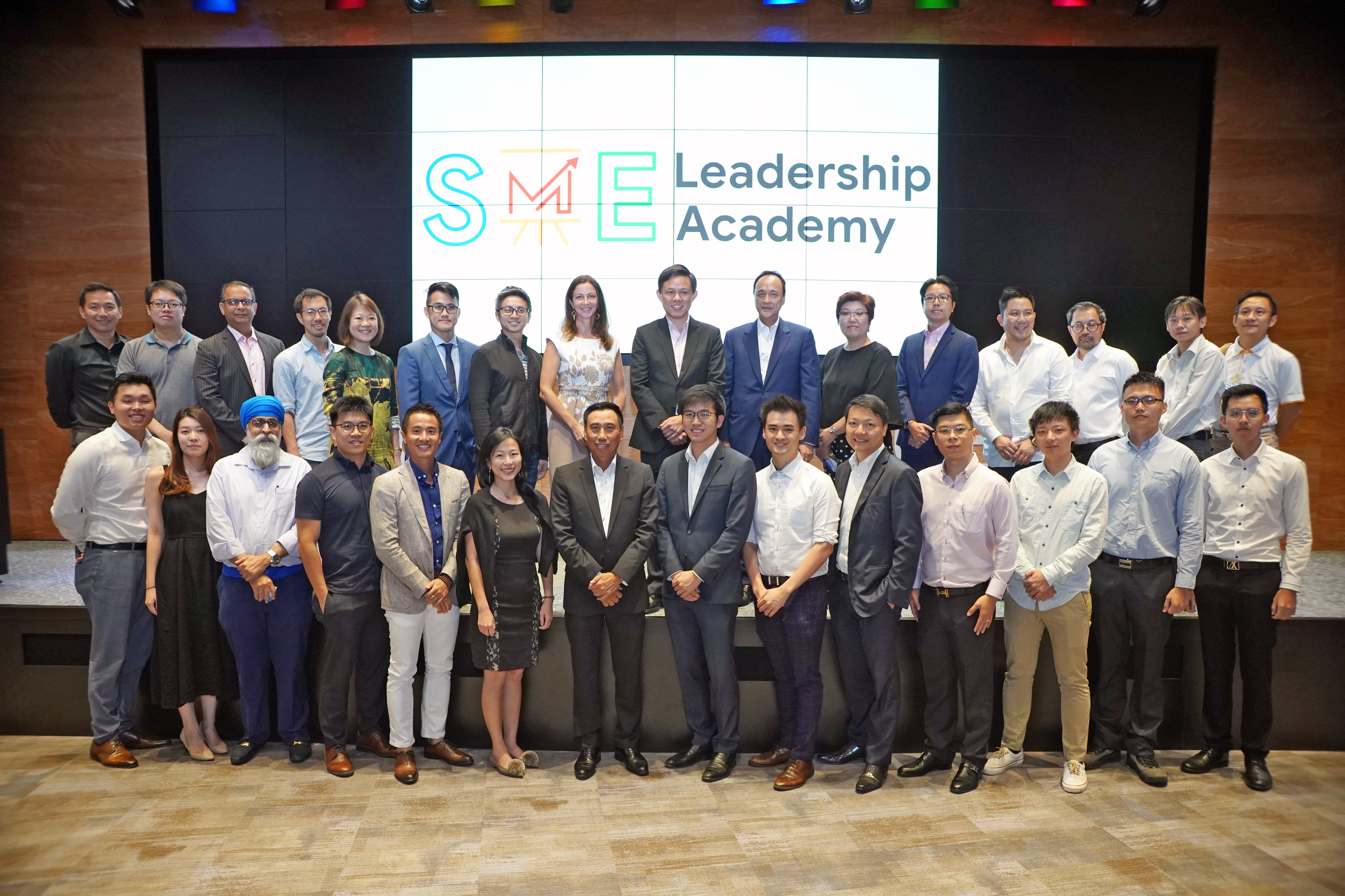Chan Chun Sing, Minister for Trade and Industry; Stephanie Davis, MD, Google SEA;  Frederick Chin, Head of Group Wholesale Banking and Markets, UOB; and graduates from the pilot cohorts of the SME Leadership Academy.  Photo courtesy: Google