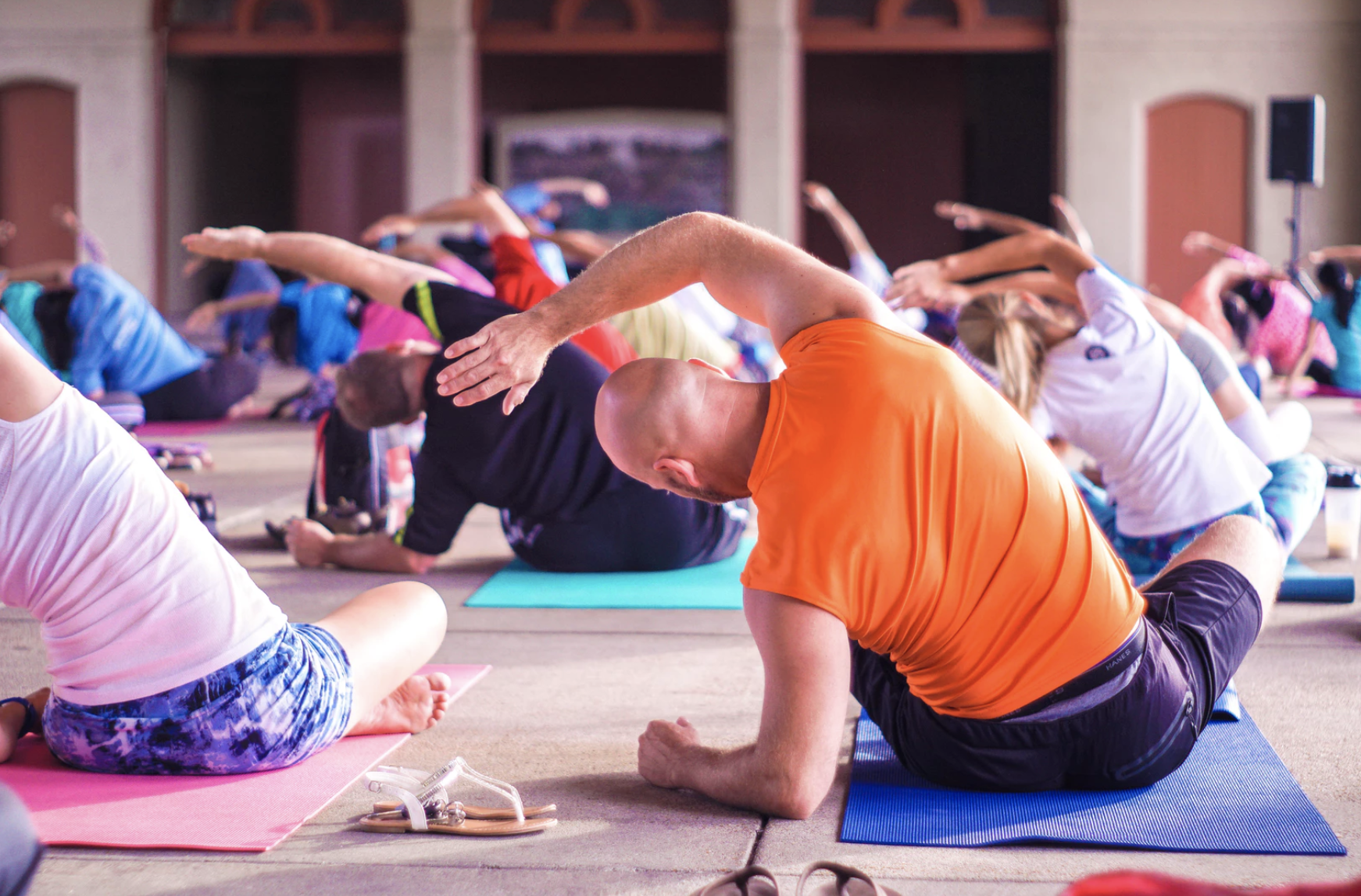 People doing yoga. Photo courtesy: unsplash