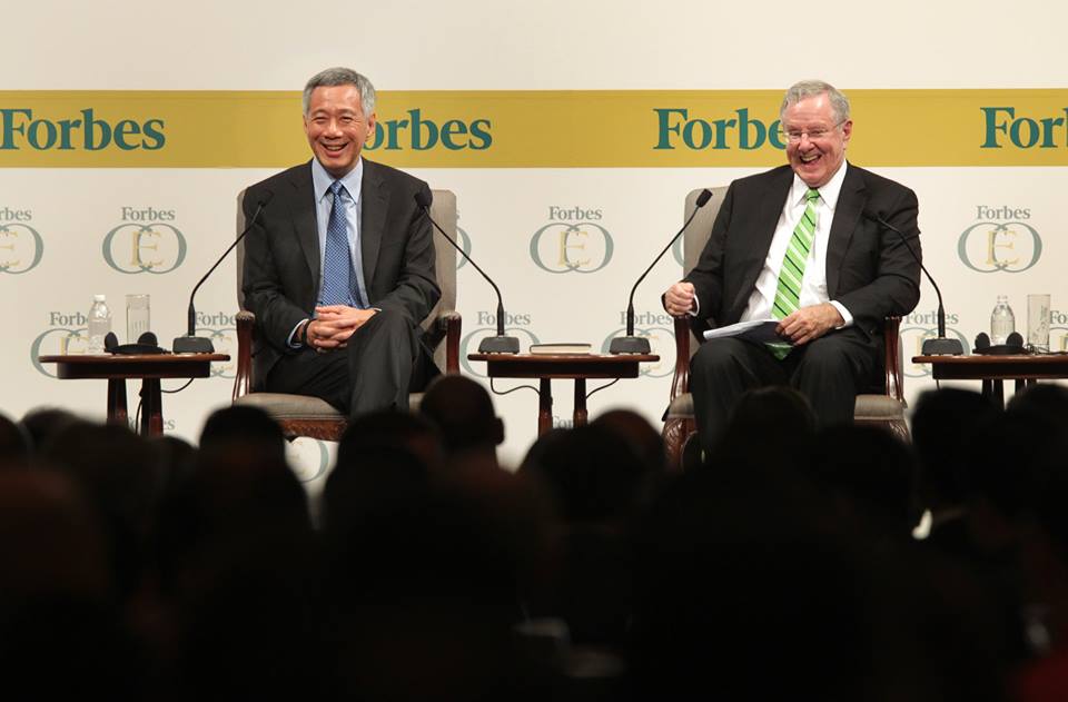 Singapore PM Lee in conversation with Steve Forbes, Chairman and Editor-in-Chief of Forbes Media at the Global CEO Conference in 2014. Photo courtesy: Facebook/Lee Hsien Loong