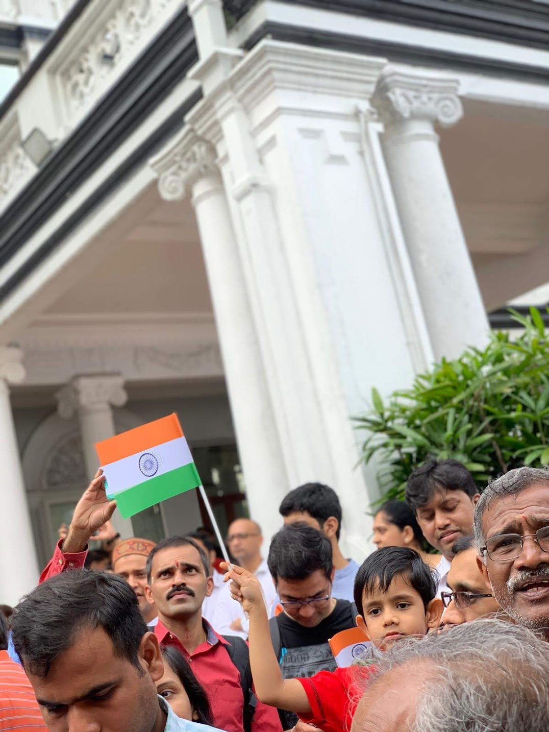Hundreds of office goers witnessed the flag hoisting before heading off to their workplaces. Photo: Connected to India