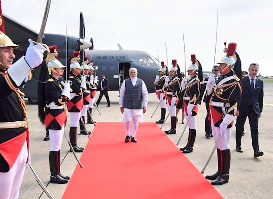 Modi is attending G7 on the invitation of French President Emmanuel Macron. Photo courtesy: Twitter/@MEAIndia