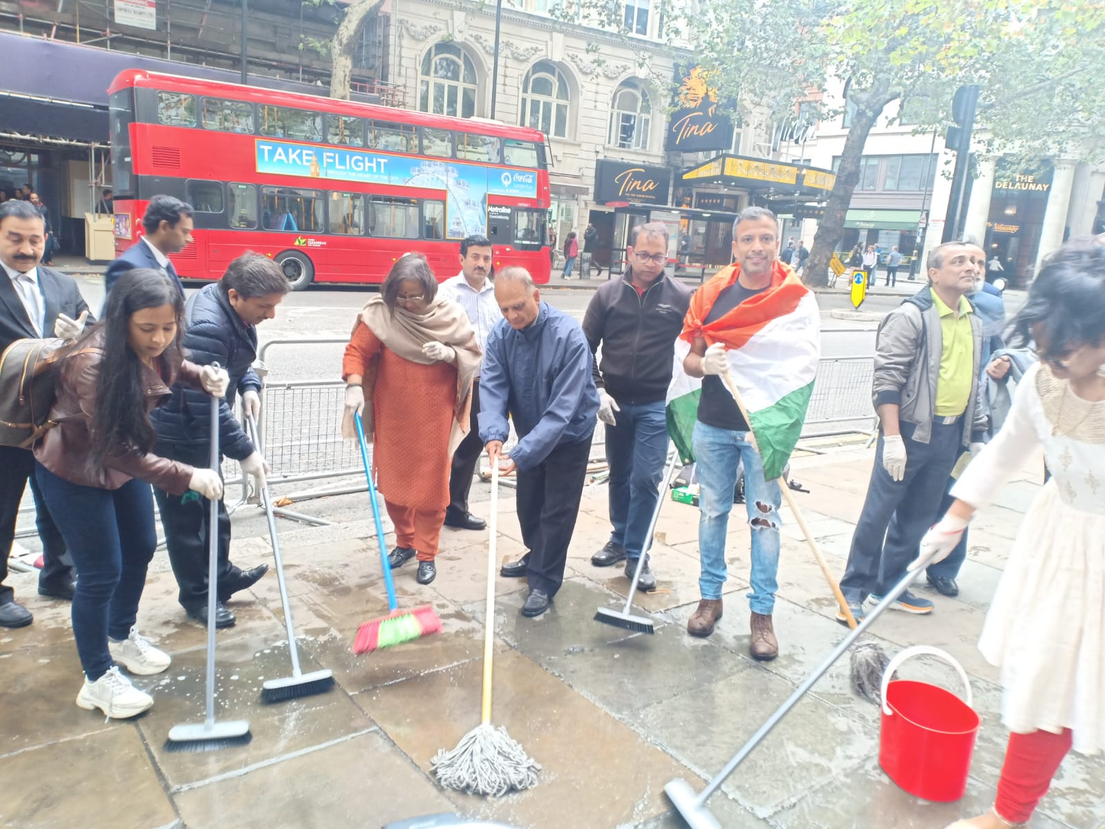 High Commissioner Ruchi Ghanshyam along with Deputy High Commissioner Charan Jeet Singh and a good number of people of Indian origin cleaned up the mess left by protestors outside the Indian consulate.