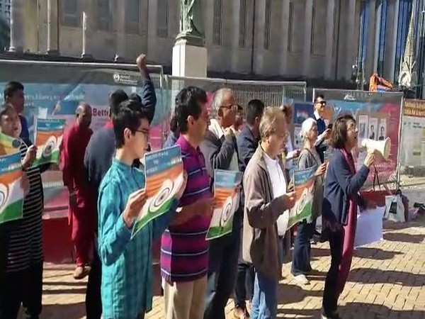 About 40 demonstrators carrying Indian flags showed their support for the move by the Indian government to abrogate Article 370 that granted special status to Jammu and Kashmir.