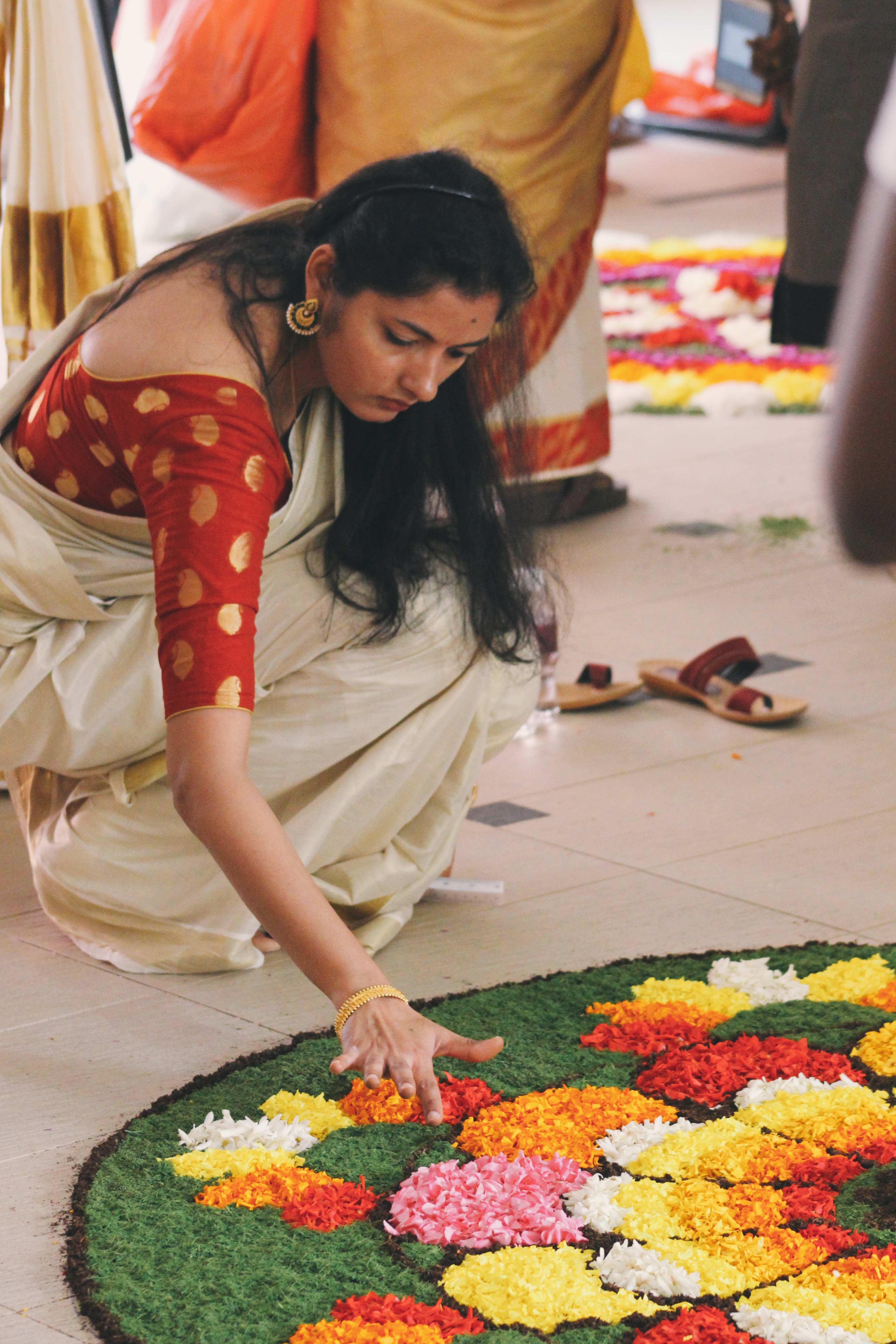 The participants were allowed to only use flowers and leaves for the 'Pookalam'. Photo: Connected to India