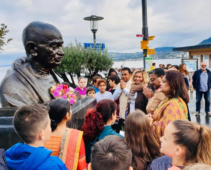 Floral tributes at the newly unveiled bust of Mahatma Gandhi at Gandhi Square in Villenevue on his 150th Birth Anniversary @IndiainSwiss