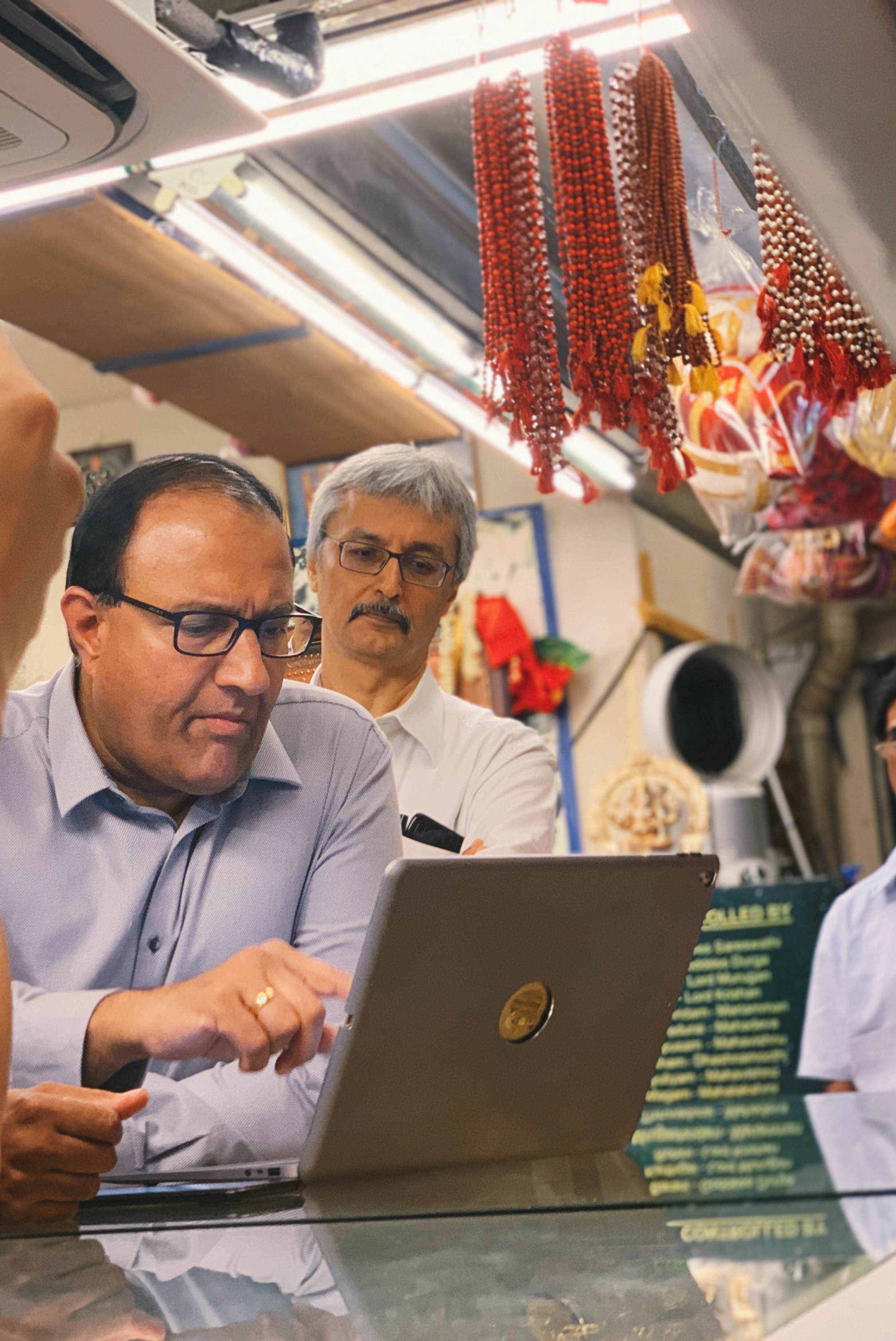 At Sakthi Sangeetha, owner Jagan D showed Minister Iswaran how he had digitalised his business operations with online market place Dei. Photo: Connected to India
