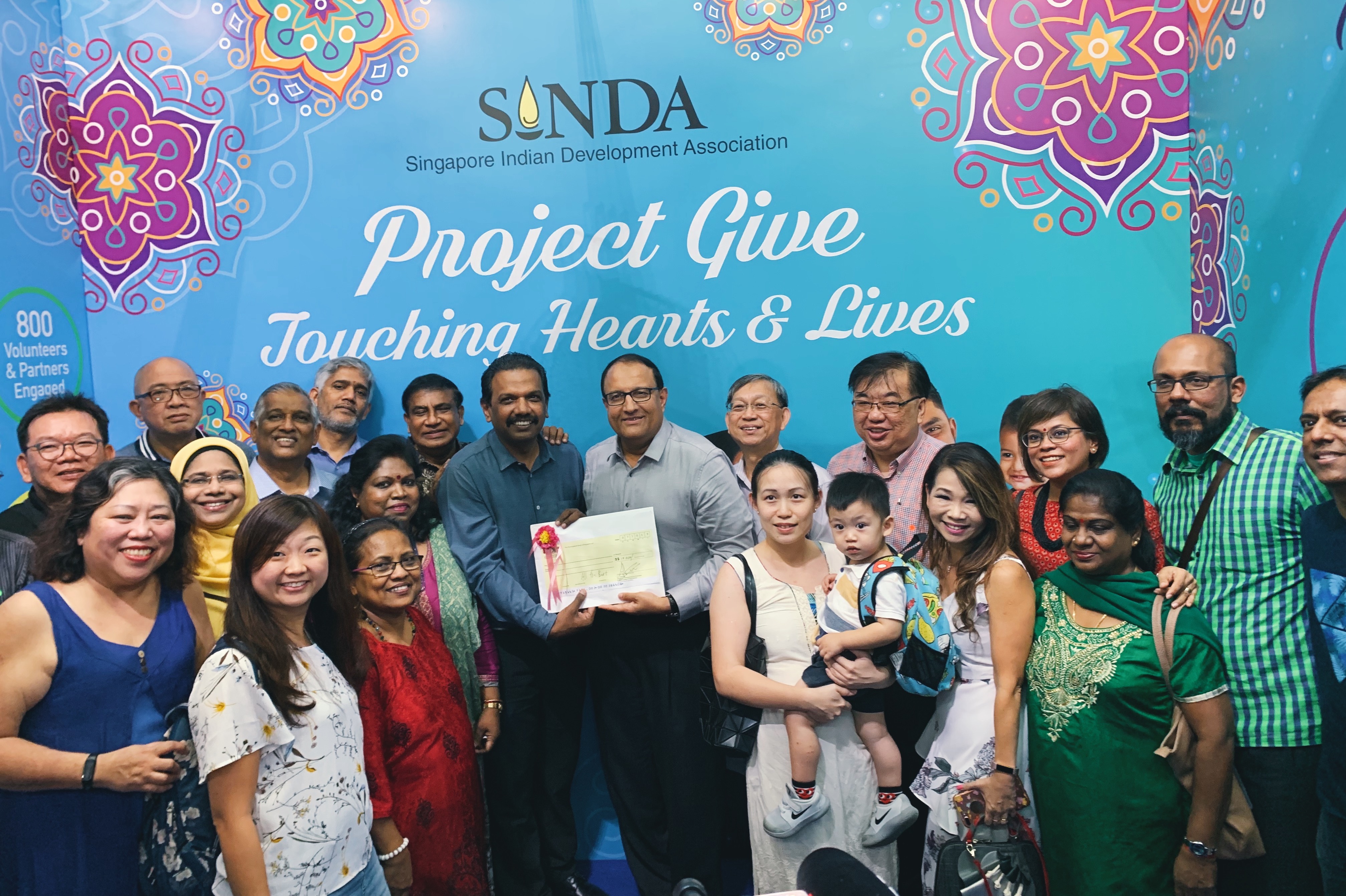 Before the walkabout commenced, Minister Iswaran presented donations to Singapore Indian Development Association (SINDA)'s Project Give. Photo: Connected to India 