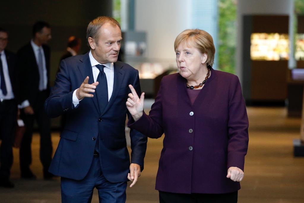 EU Council President Donald Tusk with German Chancellor Angela Merkel. Photo courtesy: Twitter/@eucopresident