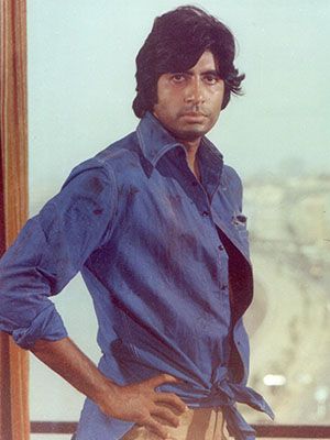 Amitabh Bachchan in a scene from Deewar (1975). ‘The blue-shirt man’ would go on to become one of his most famous roles. Photo courtesy: Forbes