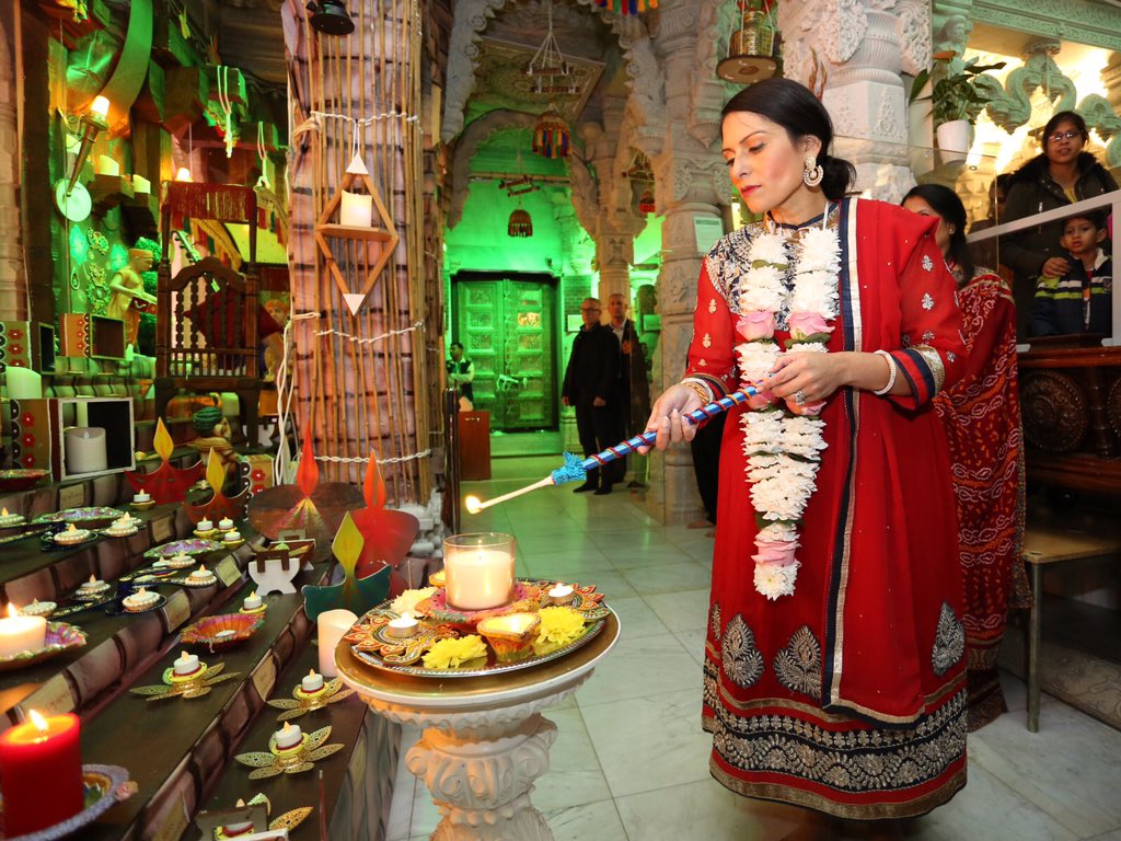 Indian-origin British Home Secretary Priti Patel celebrating Diwali. Photo courtesy: Twitter/@patel4witham