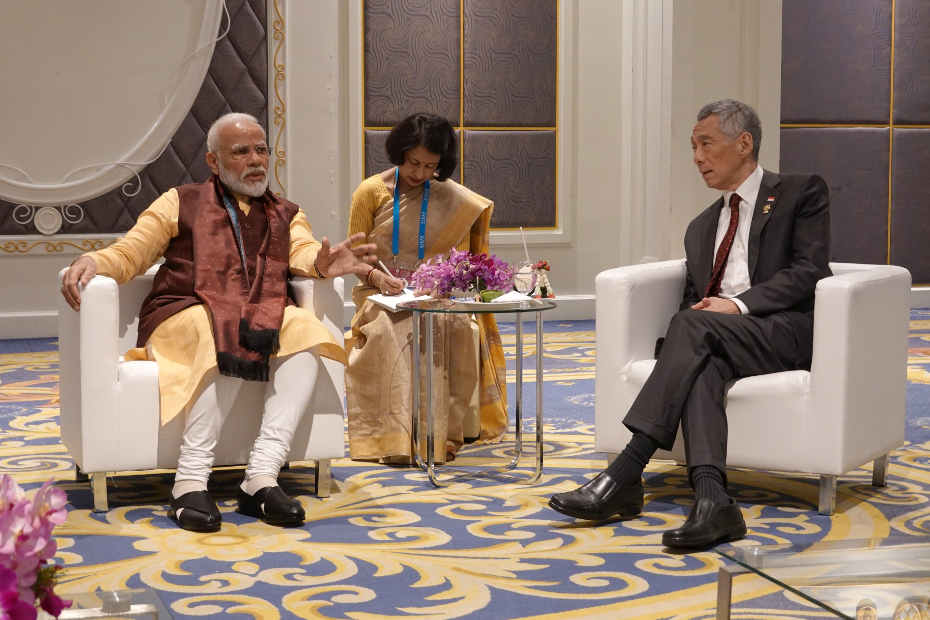 Prime Minister Lee Hsien Loong caught up with India PM Narendra Modi while waiting for the gala dinner at the ASEAN summit to begin. Photo courtesy: PMO 
