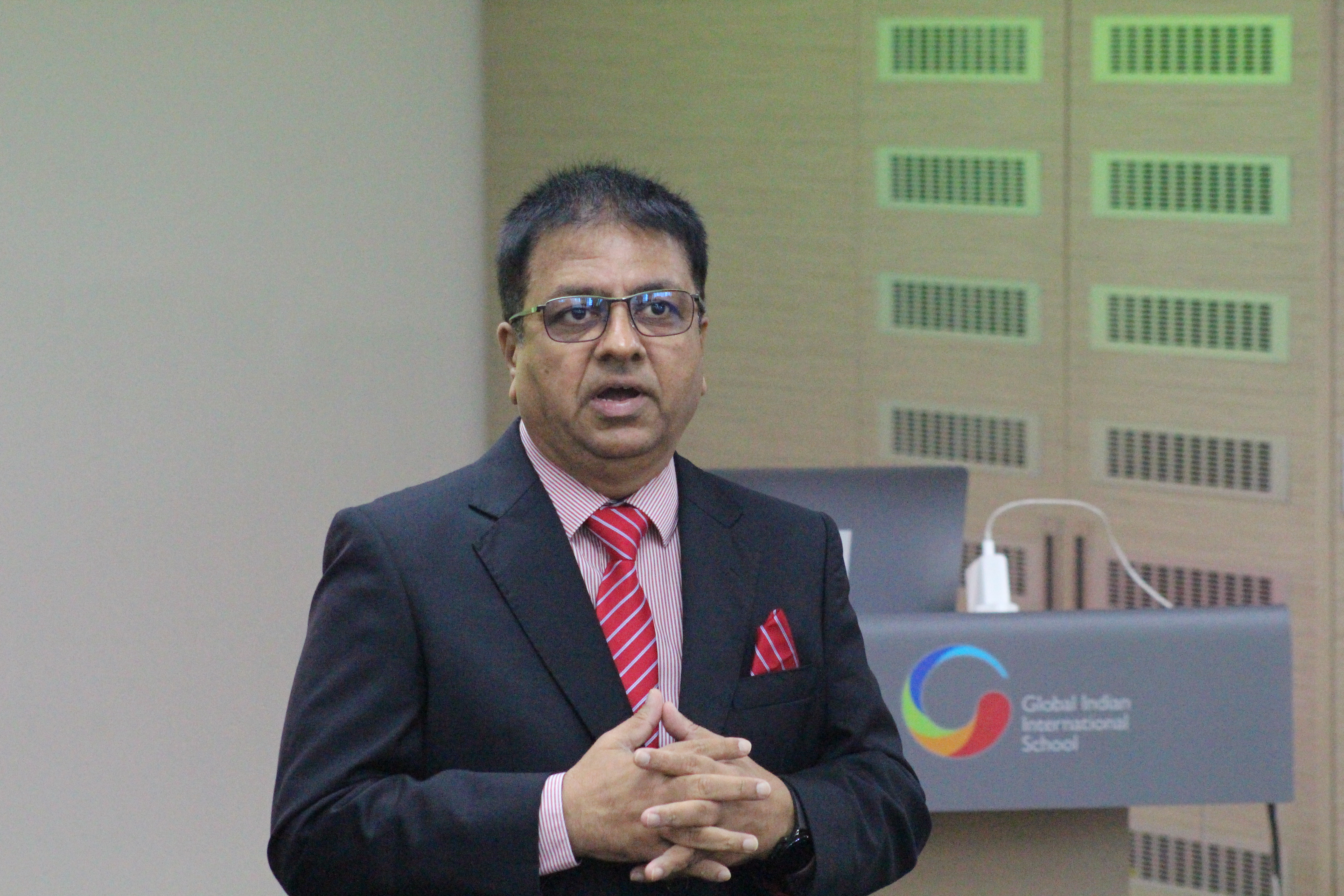 Atul Temurnikar, co-founder and chairman of GIIS, sharing about how SPEDAS is being used to help the student teams in their athletic performances. Photo: Connected to India