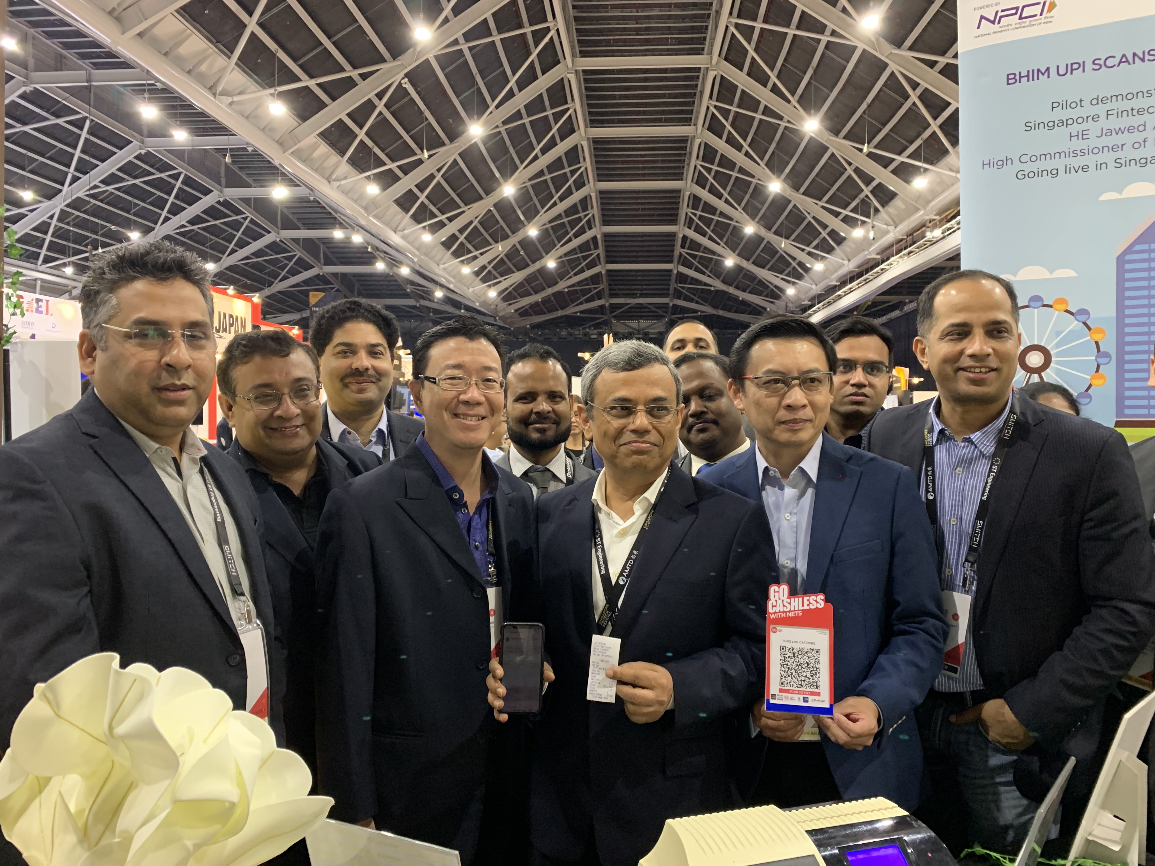H.E. Jawed Ashraf, High Commissioner of India to Singapore holding the receipt and the phone used to pay for coffee using QR based payment system BHIM at Singapore Fintech Festival 2019. Photo courtesy: Connected to India
