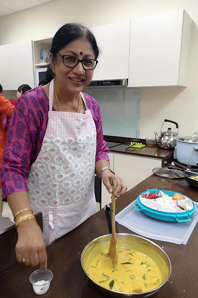 The tangy fish curry, with generous servings of salmon, by one of the special guest chefs, Mrs Jalaja Pillay,  left everyone yearning for more at the special demonstration of Malayalee cooking. Photo Credit: SMA Youth Wing